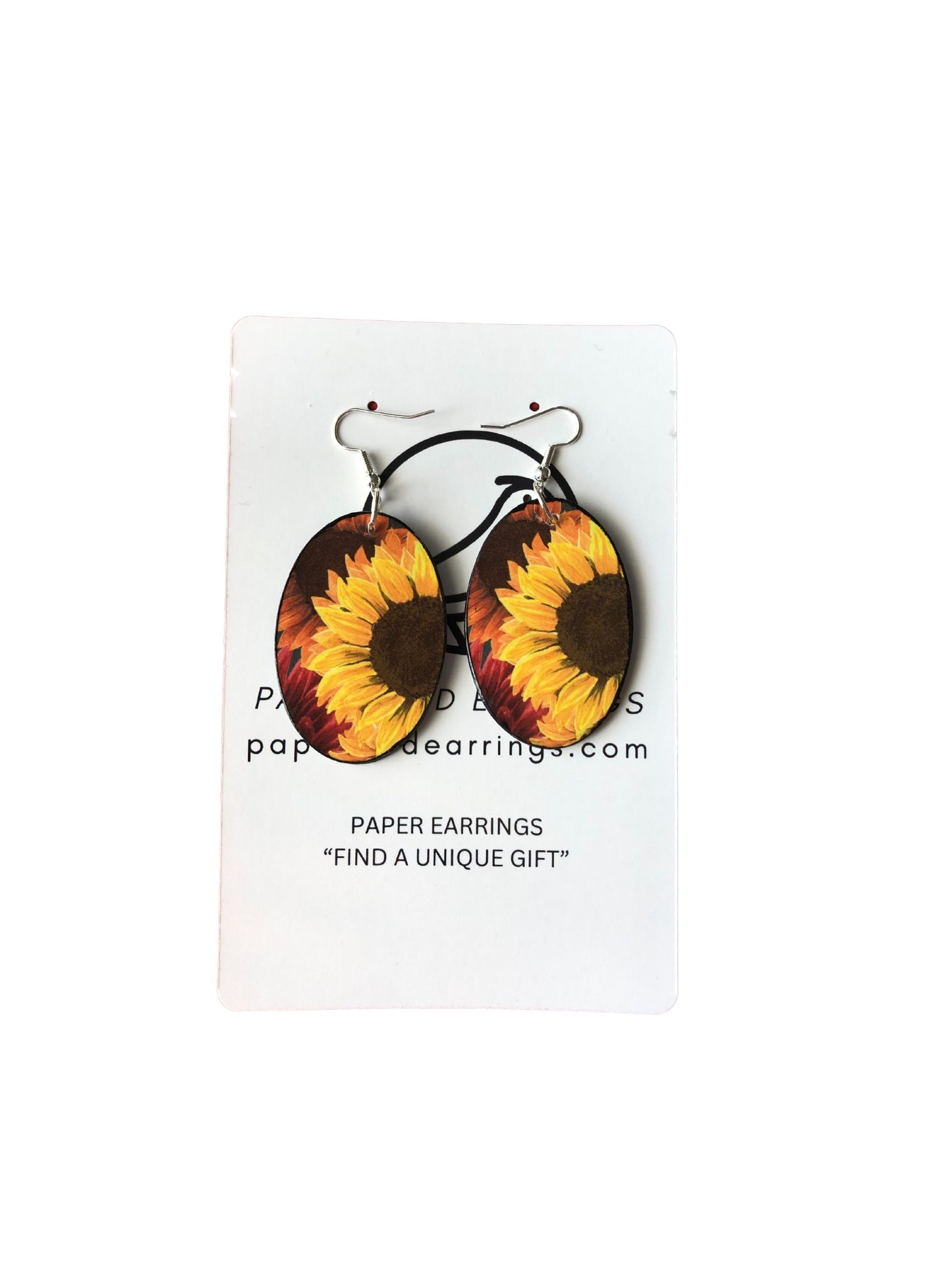 Sunflower-shaped paper earrings on a white card with branding text.