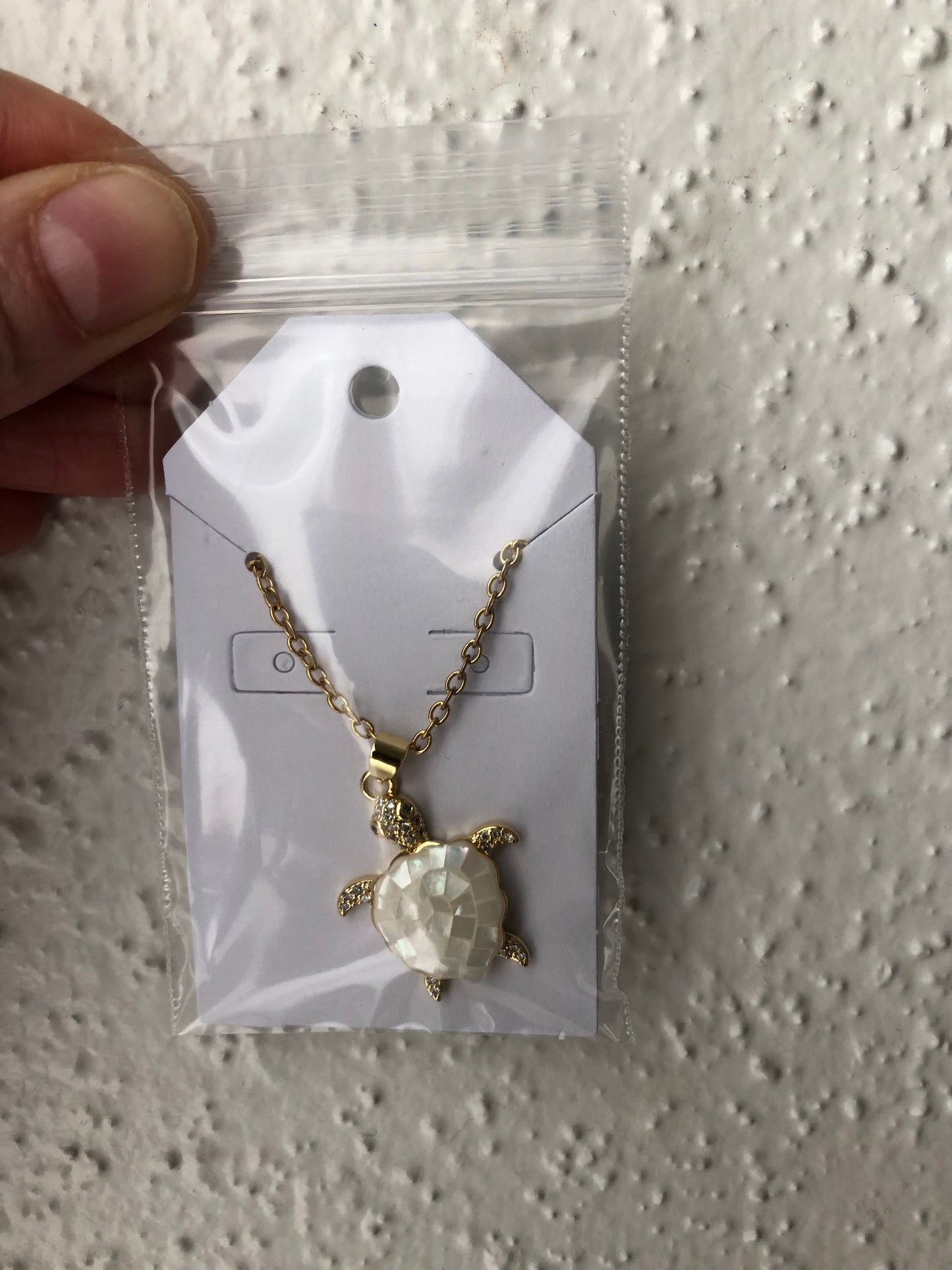 Gold mother of pearl turtle necklace