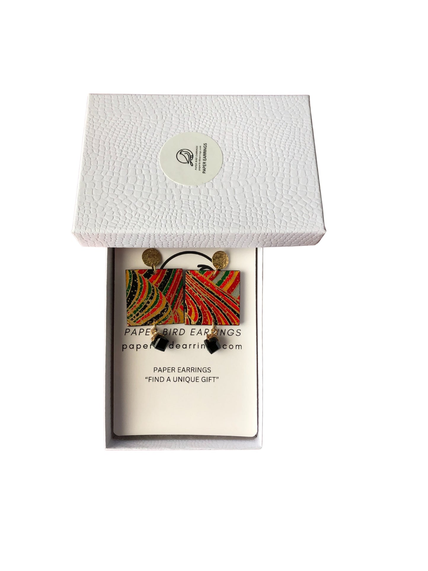 Earring packaging with colorful paper bird design on a white background