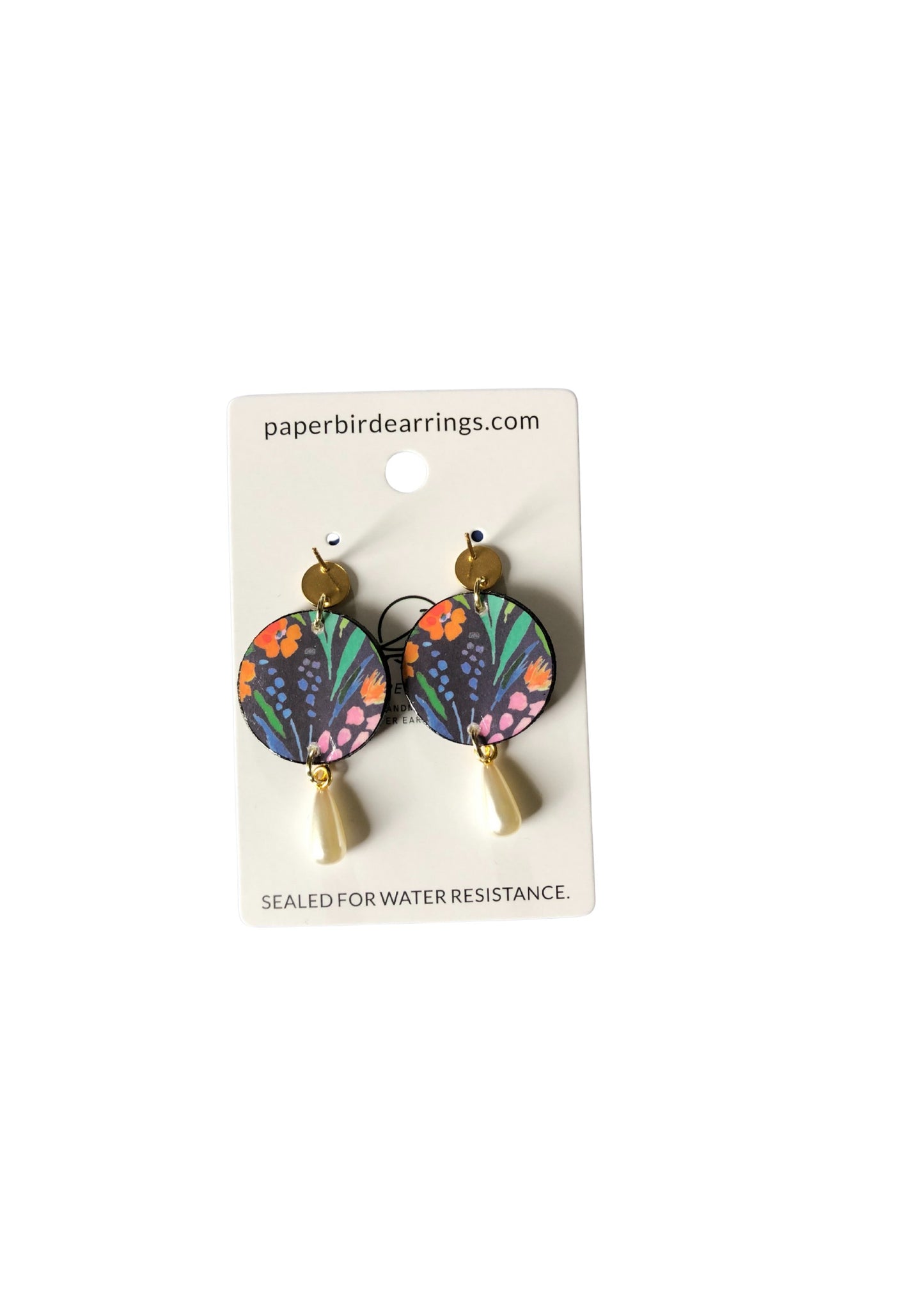 Pair of floral earrings on a 'paperbirdearrings.com' branded card with water resistance seal text.