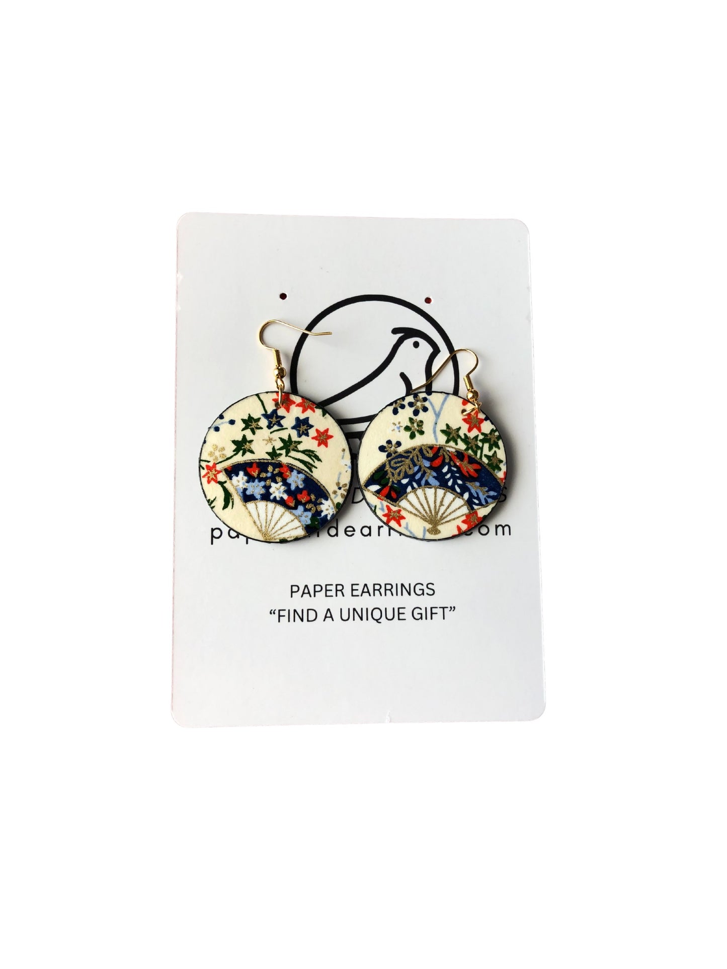 Pair of paper earrings on a white card with text