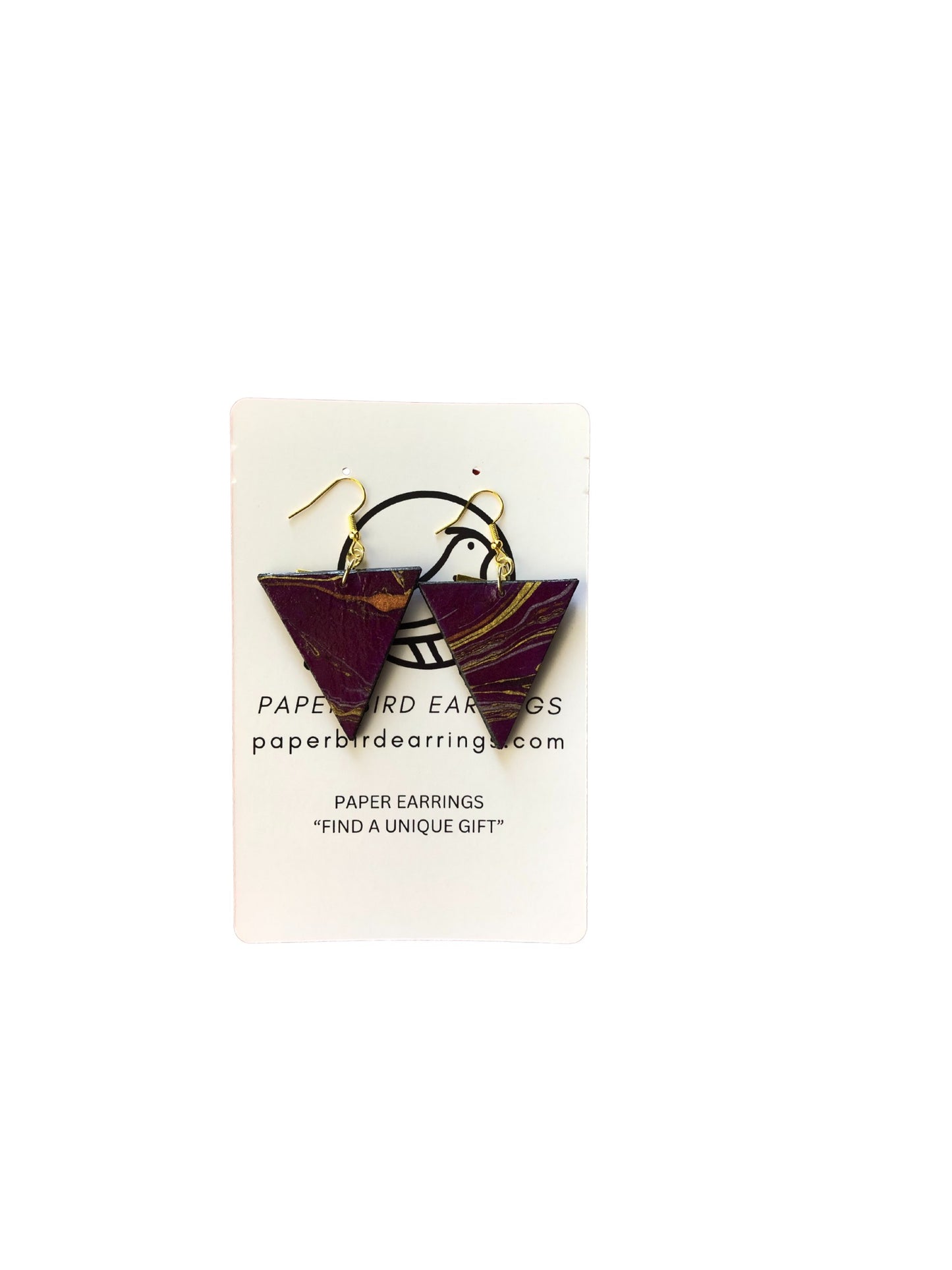 Pair of paper earrings on a white card with branding text.