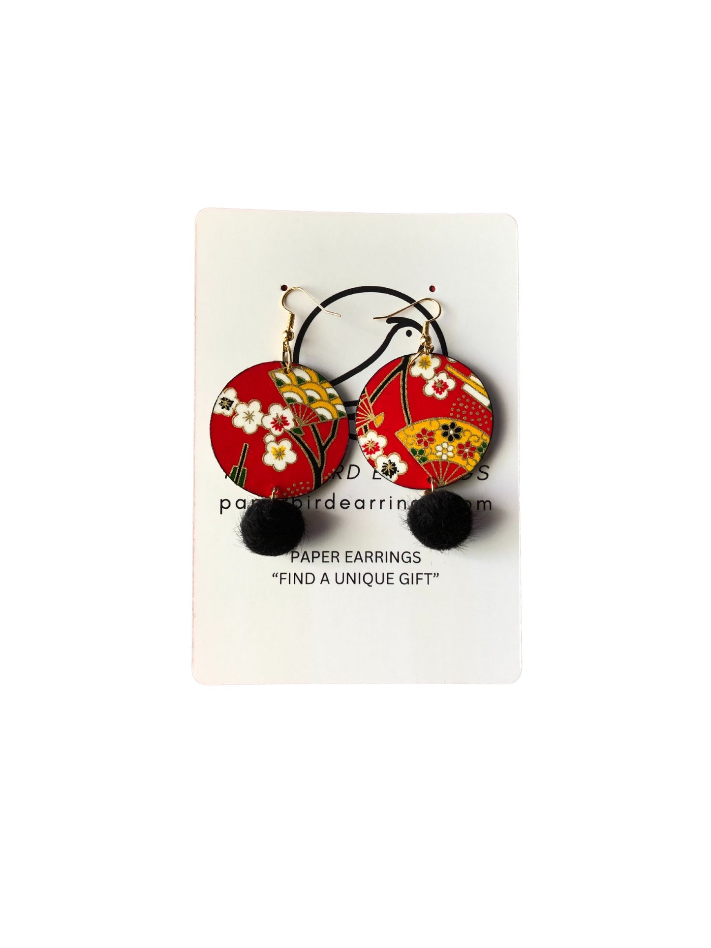 Pair of floral paper earrings on a white card with text.
