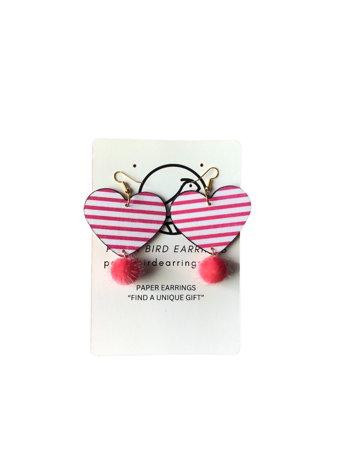 Heart-shaped striped earrings with red pom-poms on a white card