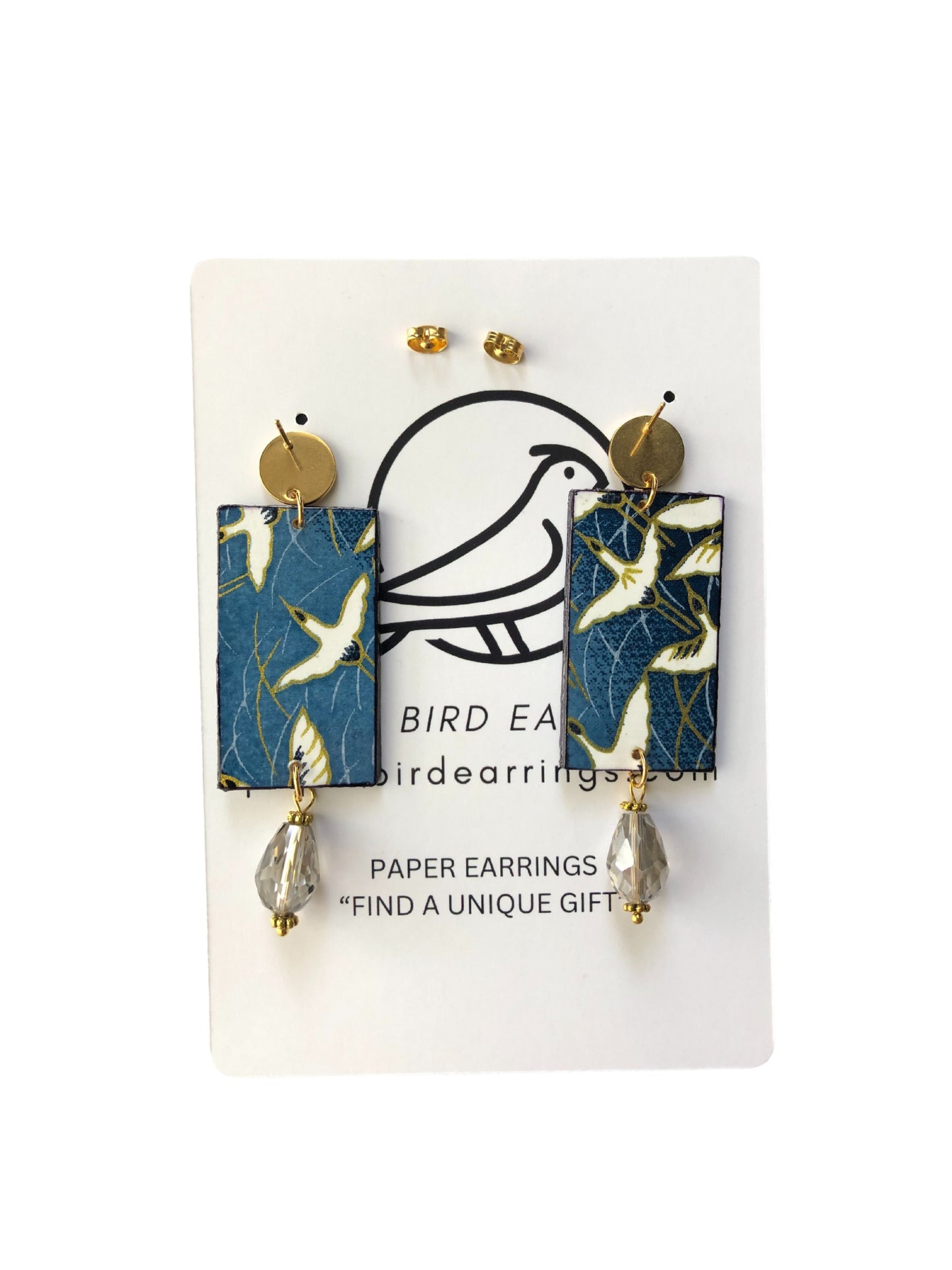 Bird-shaped earrings on a branded card with a white background
