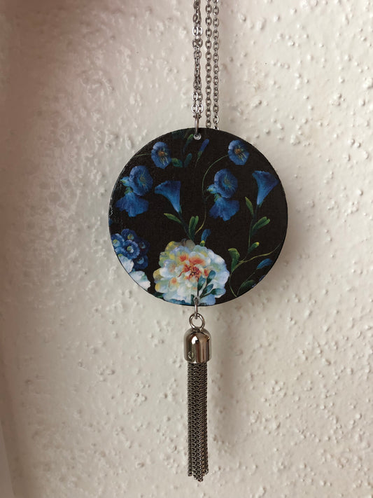 Round floral paper pendant on a chain 