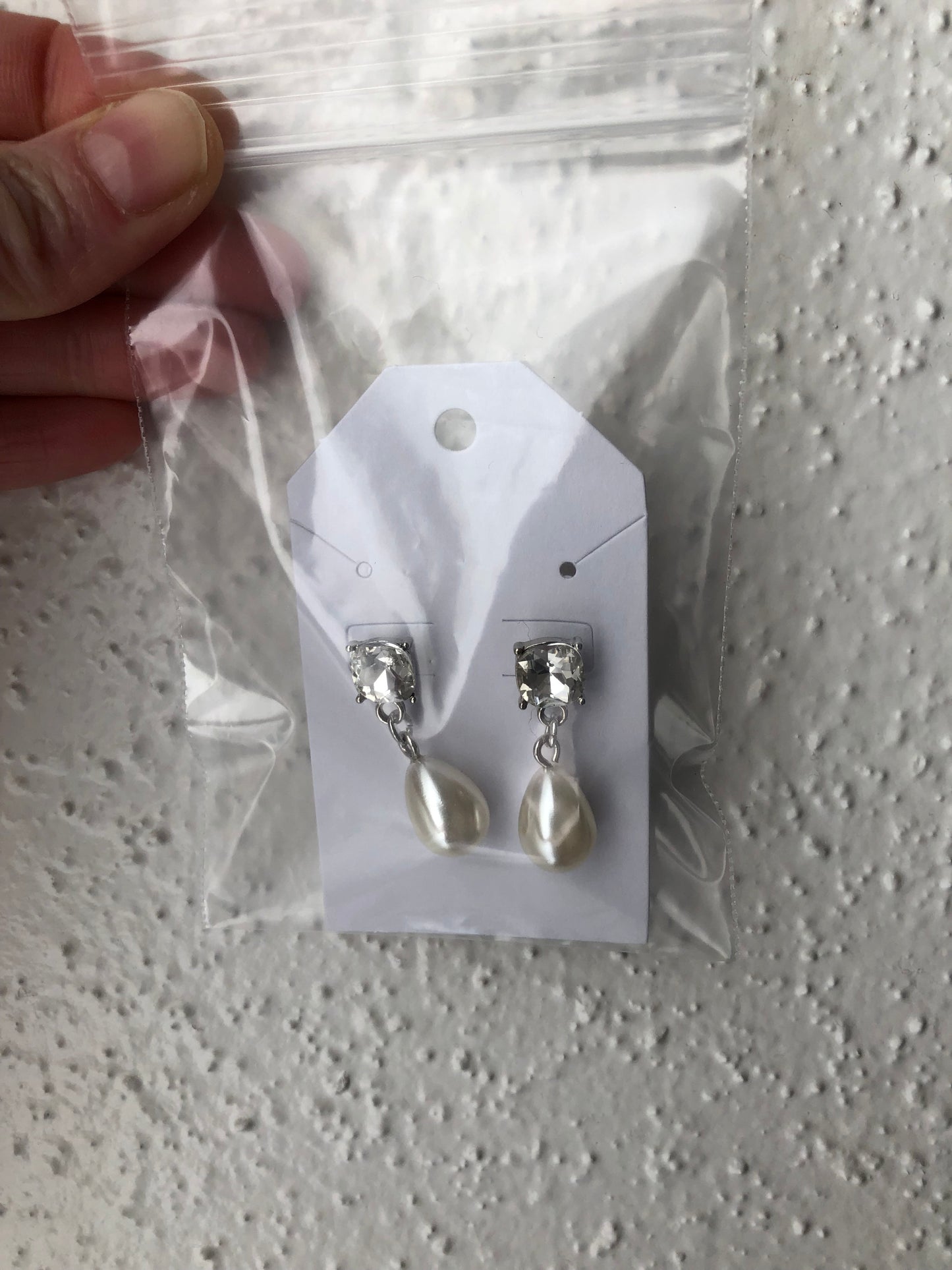 Pearl and rhinestone earrings