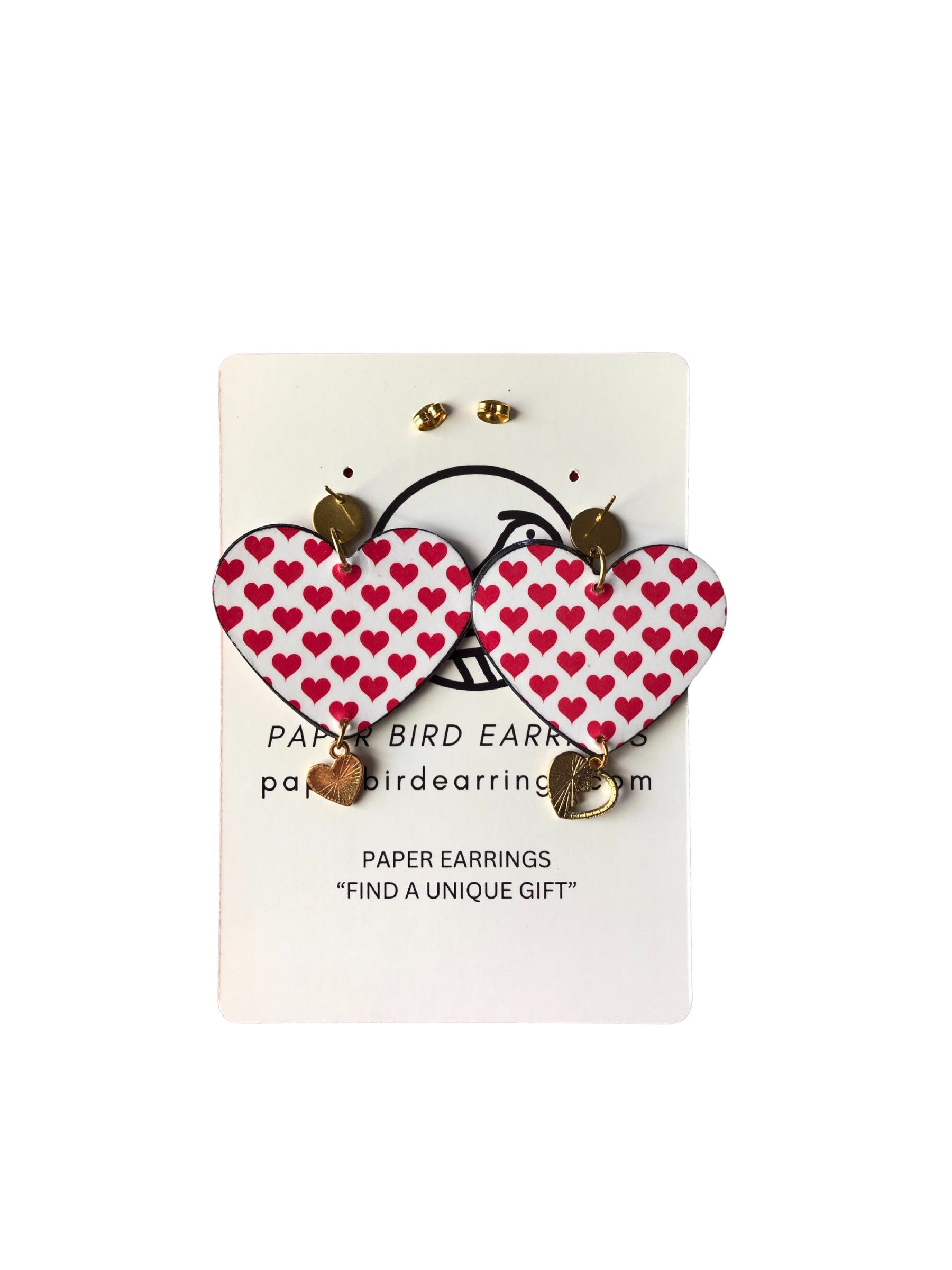 Heart-shaped earrings with red heart pattern on a white card with text