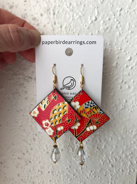 handmade paper earrings with a yellow sensu fan on red rhombus shape handmade paper bird earrings