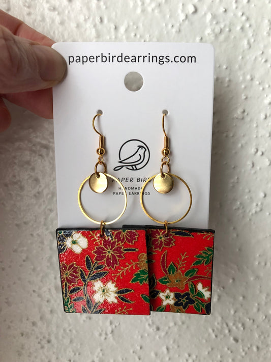 paper earrings with a floral pattern reminiscence of cherry blossom on a red square design
handmade paper bird earrings