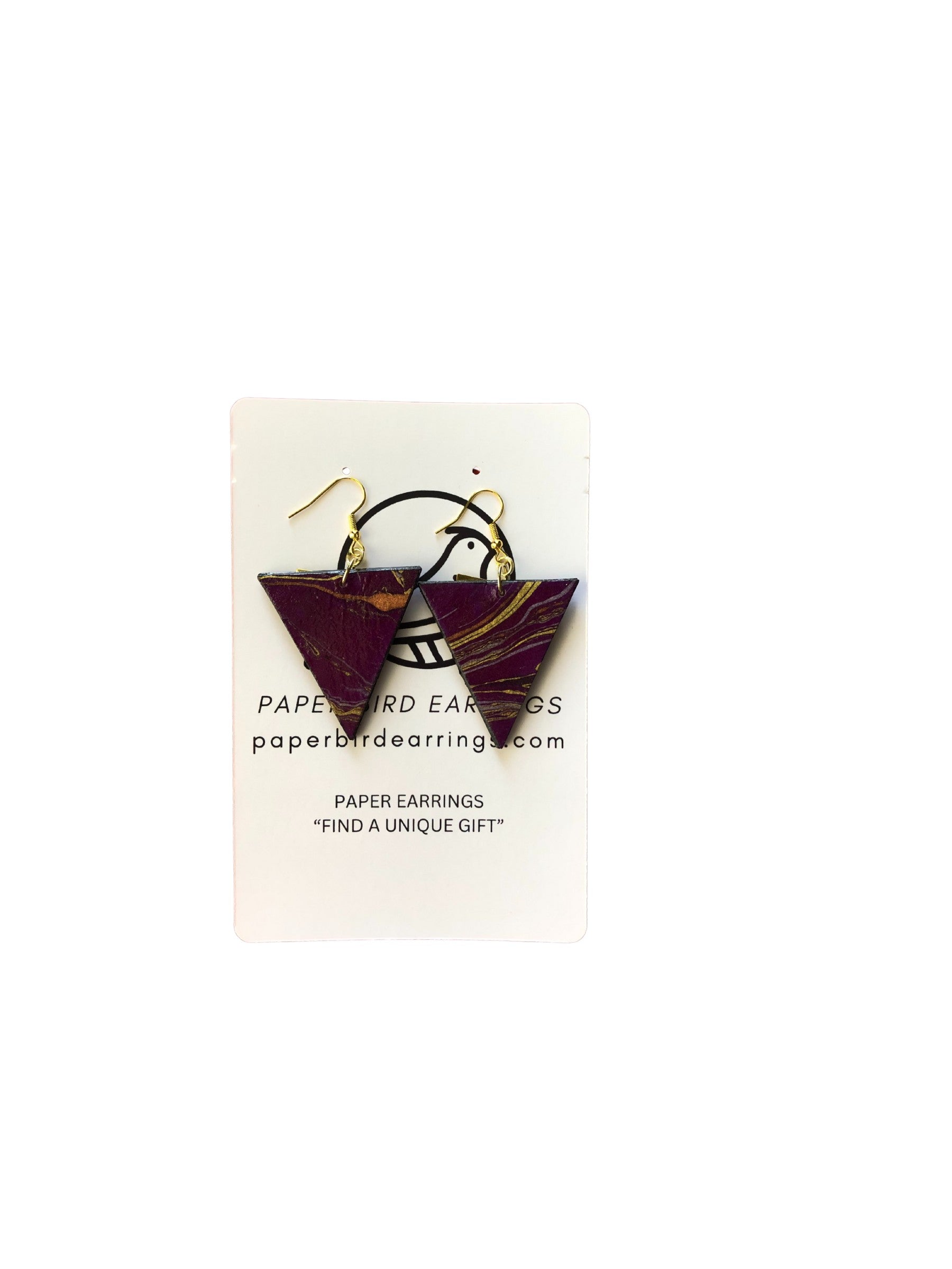 Pair of paper earrings on a white card with branding text.