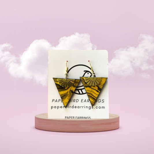 Triangle-shaped earrings on a card with 'Paper Bird Earrings' branding against a pink background