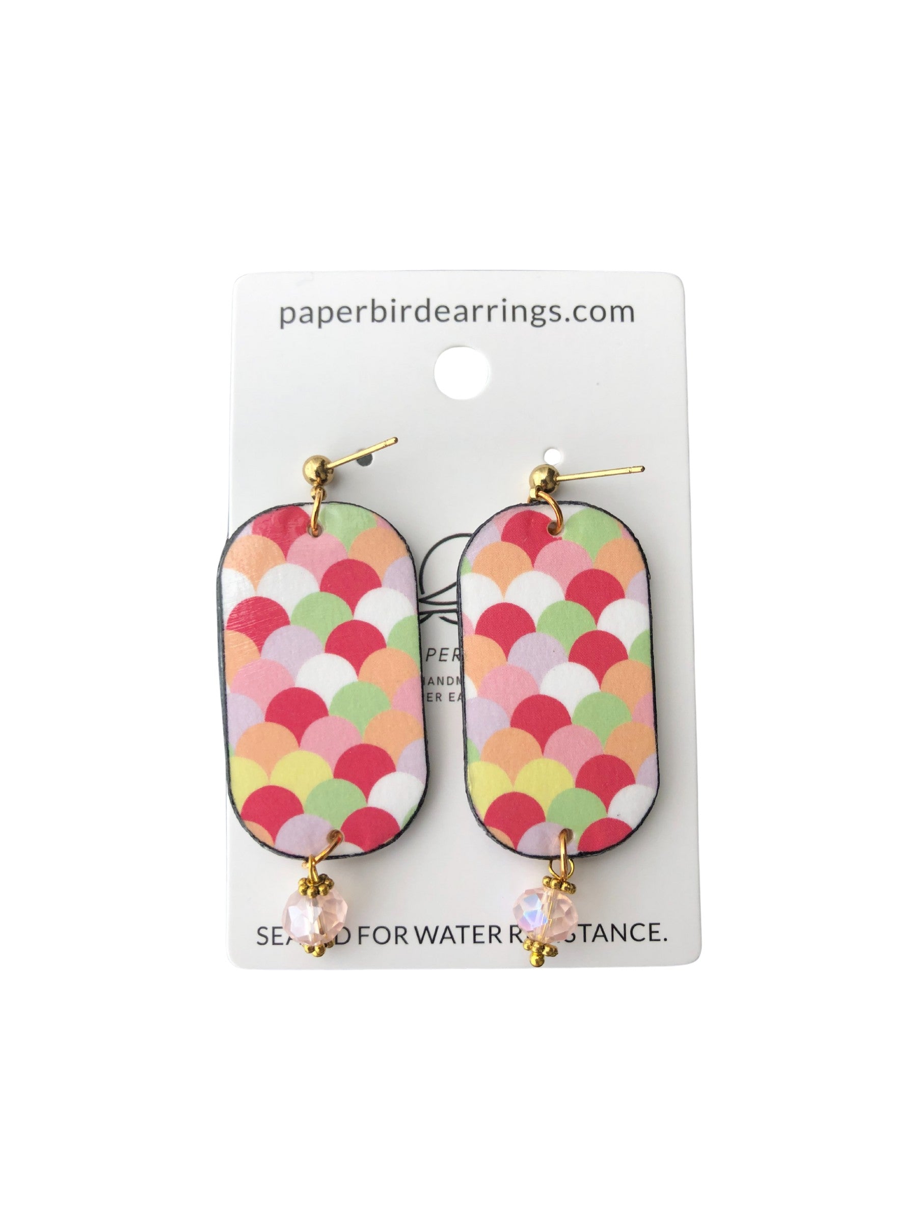 Colorful scale-patterned earrings on a branded card with 'paperbirdearrings.com' text.
